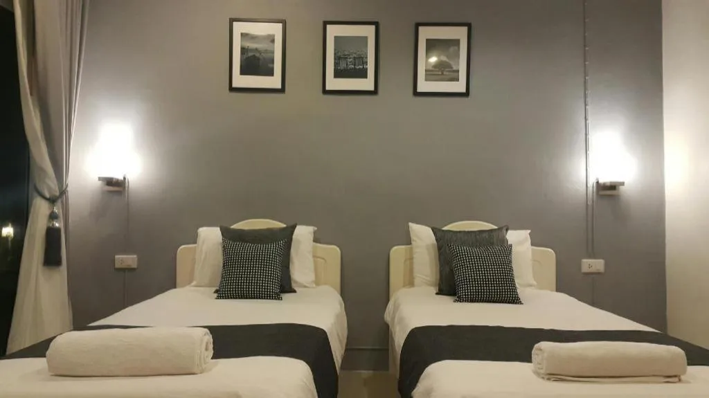 Bed in Baan Chao Mai Beach House