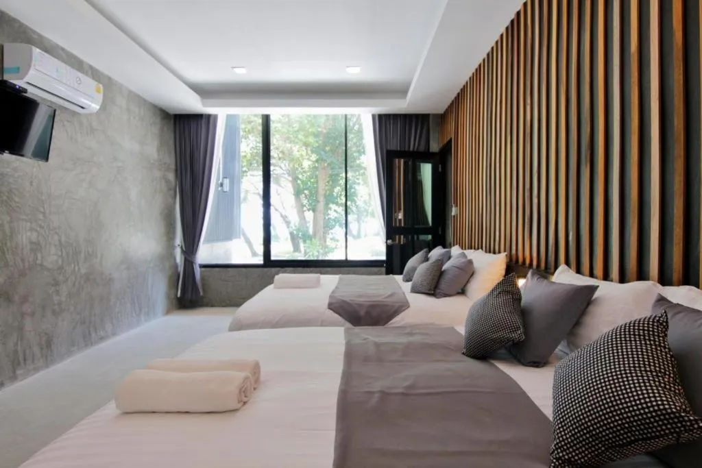 Bed in Baan Chao Mai Beach House