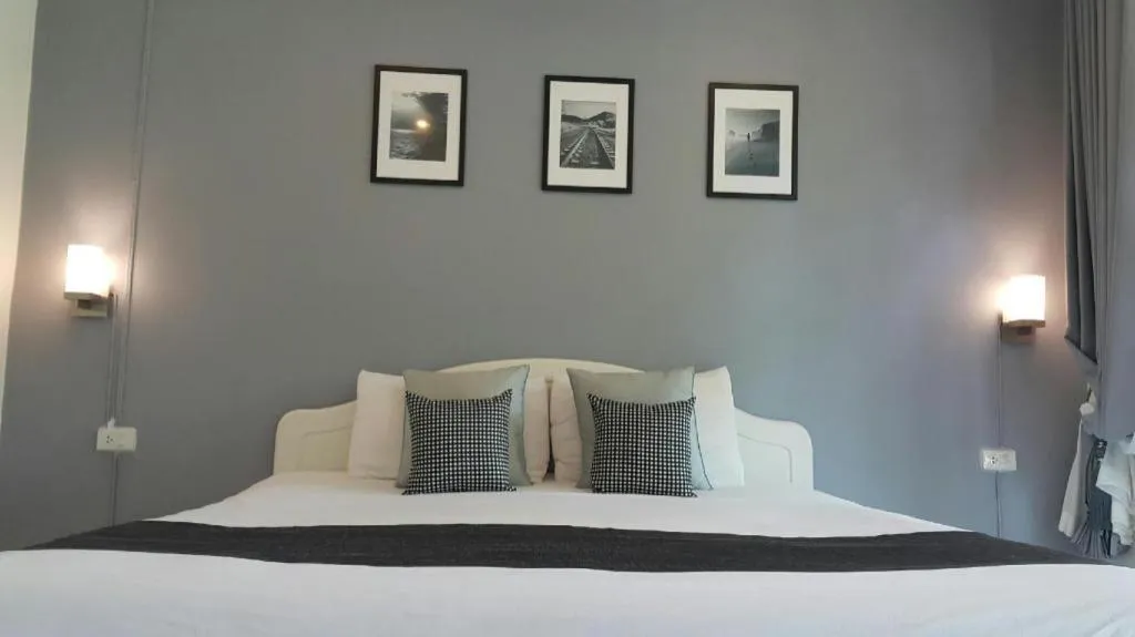 Bed in Baan Chao Mai Beach House