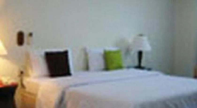 Bed in The Majestic Sakon Nakhon Hotel