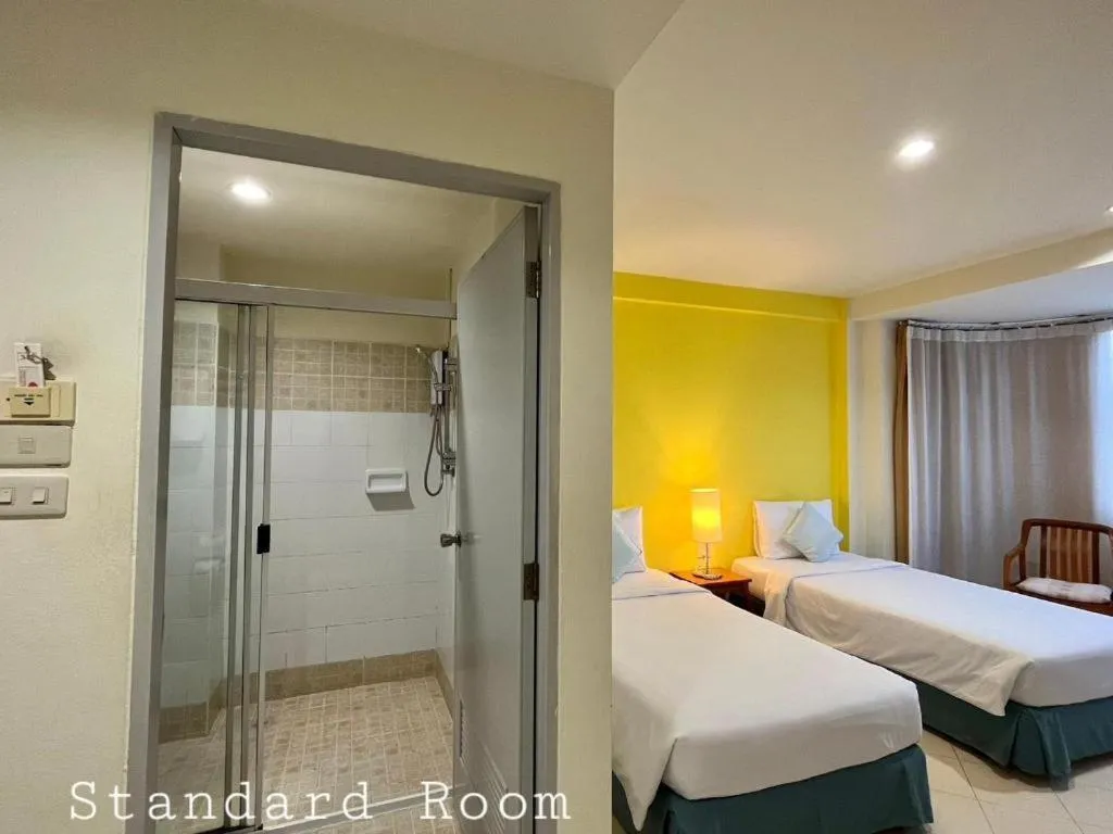 Bed in The Majestic Sakon Nakhon Hotel