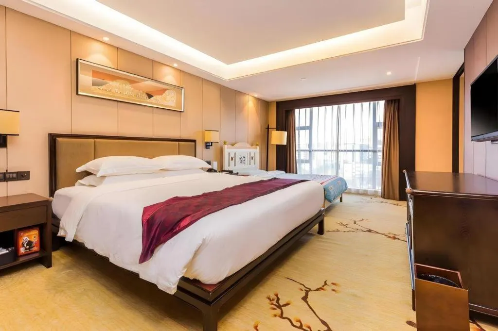 Bed in Xiang Yun Sha Garden Hotel