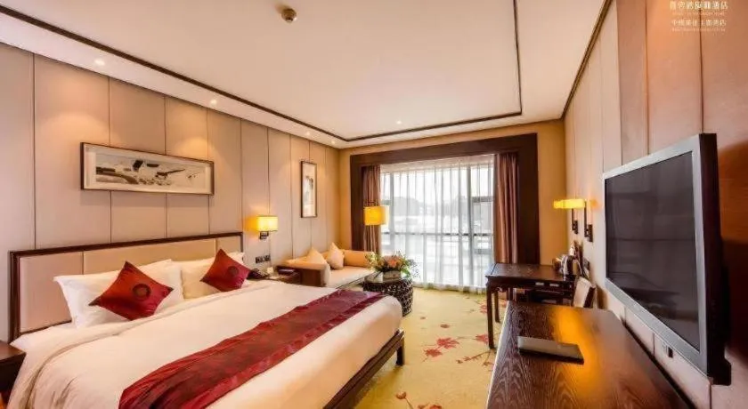 Bed in Xiang Yun Sha Garden Hotel