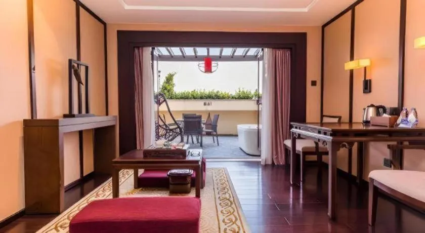 Bed in Xiang Yun Sha Garden Hotel