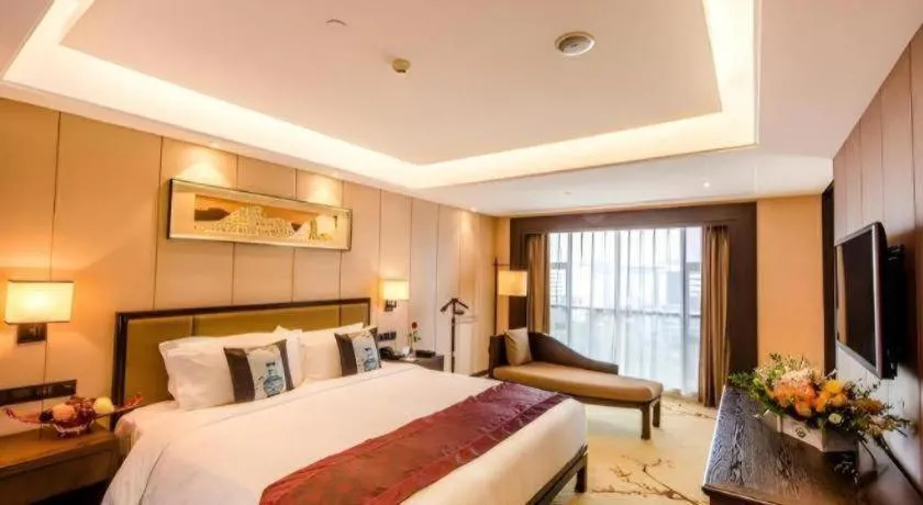 Bed in Xiang Yun Sha Garden Hotel