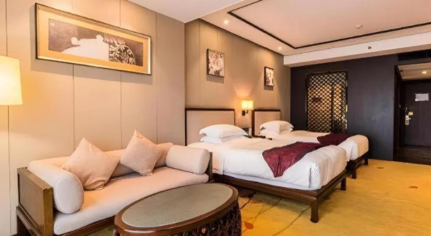 Bed in Xiang Yun Sha Garden Hotel