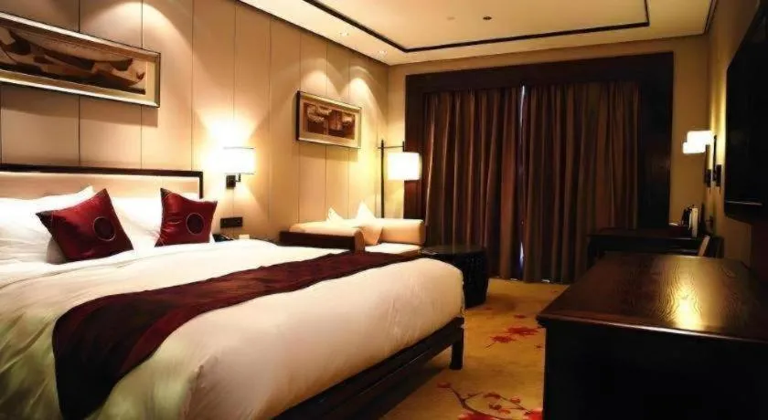 Bed in Xiang Yun Sha Garden Hotel