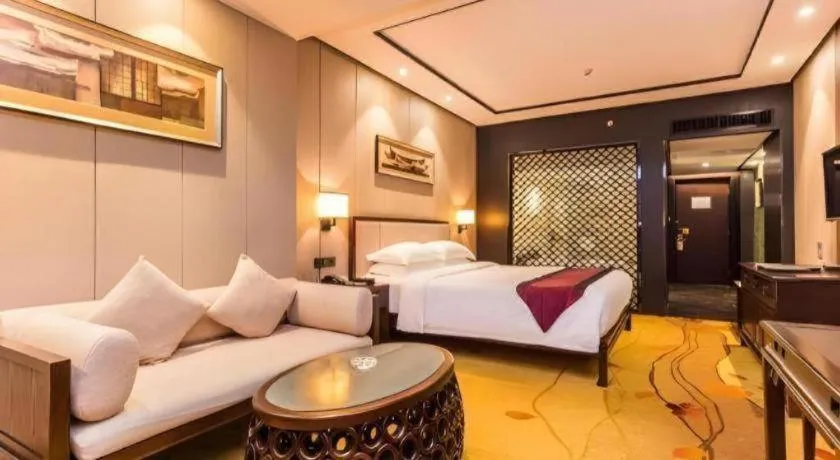 Bed in Xiang Yun Sha Garden Hotel