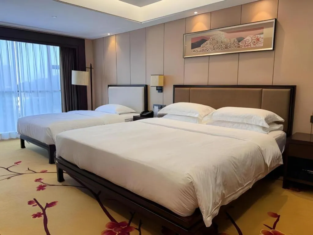 Bed in Xiang Yun Sha Garden Hotel