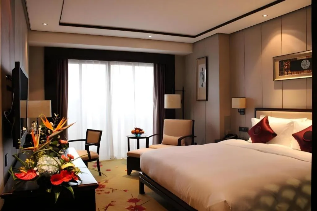 Bed in Xiang Yun Sha Garden Hotel