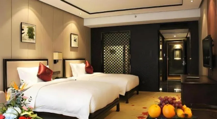 Bed in Xiang Yun Sha Garden Hotel