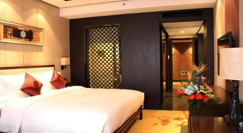 Bed in Xiang Yun Sha Garden Hotel