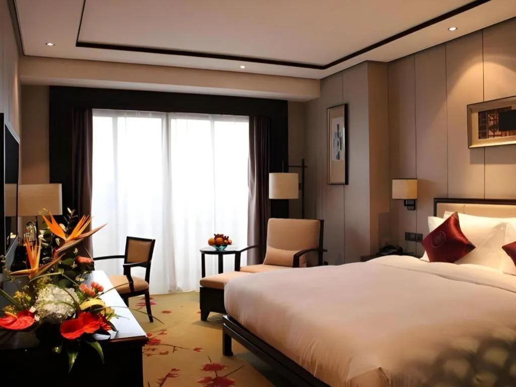 Bed in Xiang Yun Sha Garden Hotel