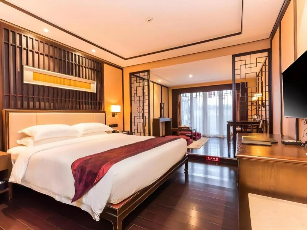 Bed in Xiang Yun Sha Garden Hotel