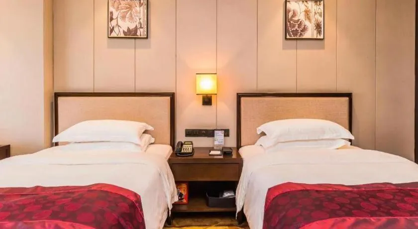 Bed in Xiang Yun Sha Garden Hotel