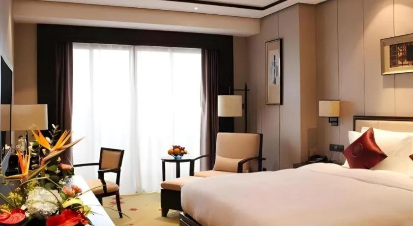 Bed in Xiang Yun Sha Garden Hotel