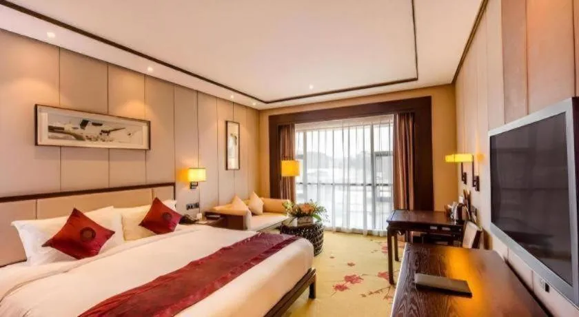 Bed in Xiang Yun Sha Garden Hotel