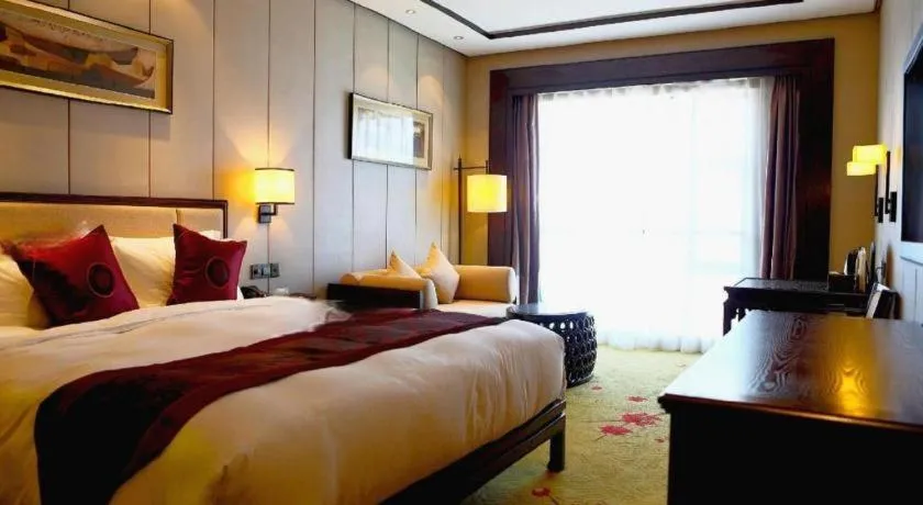 Bed in Xiang Yun Sha Garden Hotel
