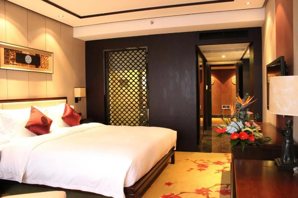 Bed in Xiang Yun Sha Garden Hotel