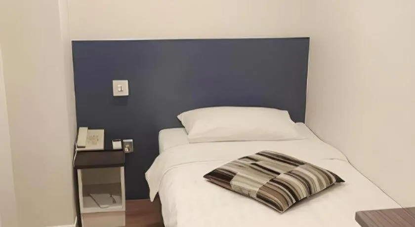 Bed in Goodrich Hotel