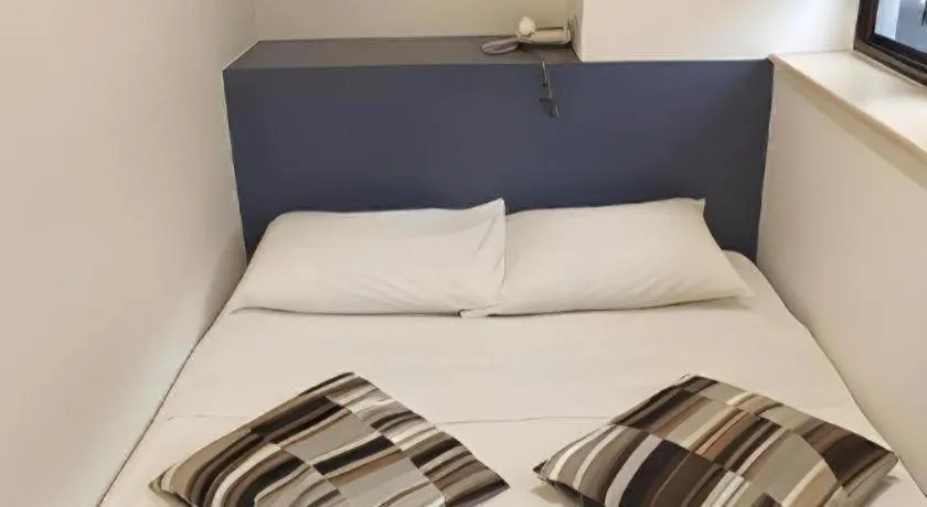 Bed in Goodrich Hotel