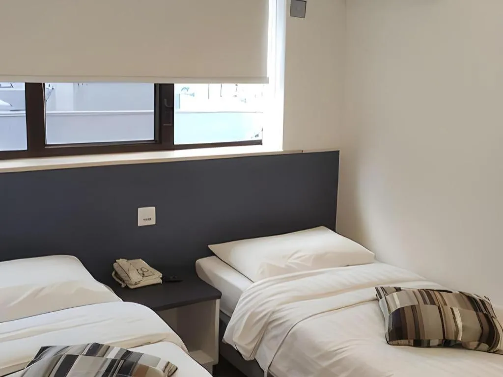 Bed in Goodrich Hotel