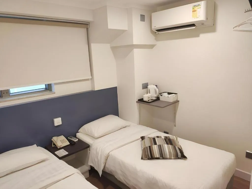 Bed in Goodrich Hotel