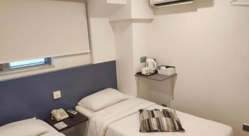 Bed in Goodrich Hotel