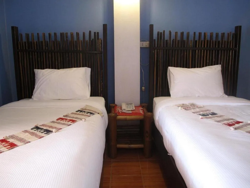 Bed in I Am Chiang Rai Resort