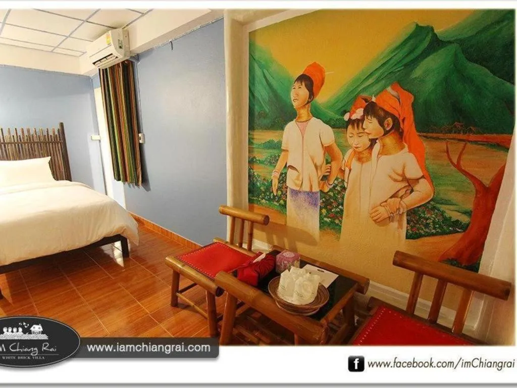 Bed in I Am Chiang Rai Resort