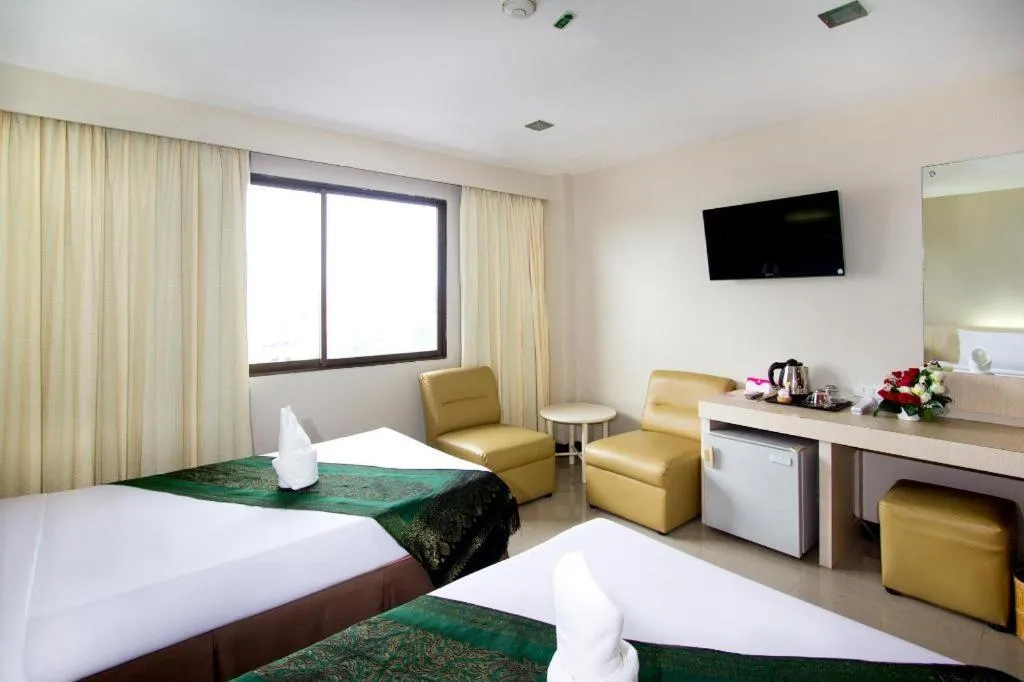 Bed in Hatyai Rama Hotel