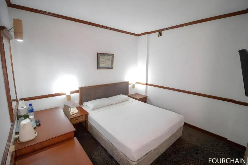 Bed in Four Chain View Hotel