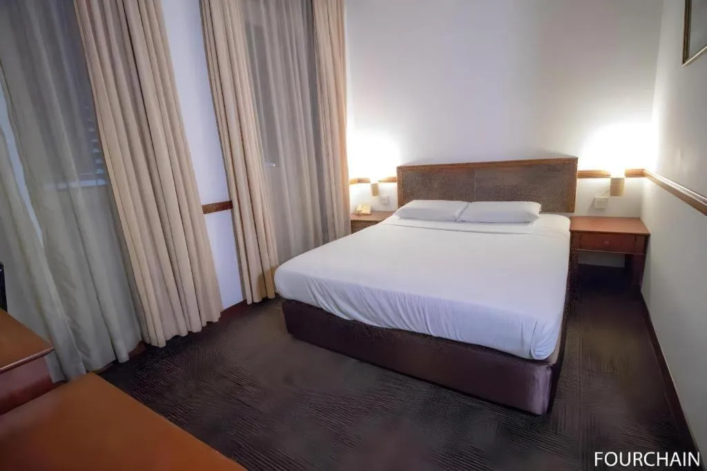 Bed in Four Chain View Hotel