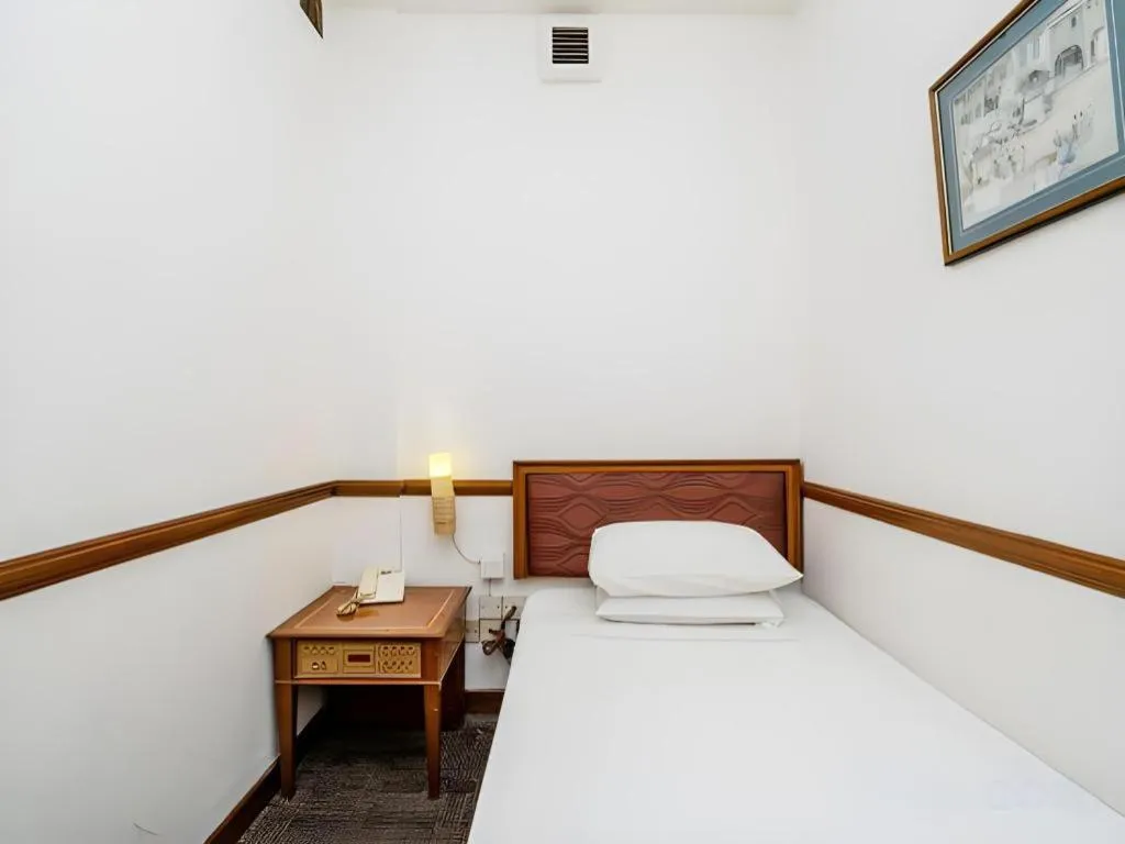 Bed in Four Chain View Hotel