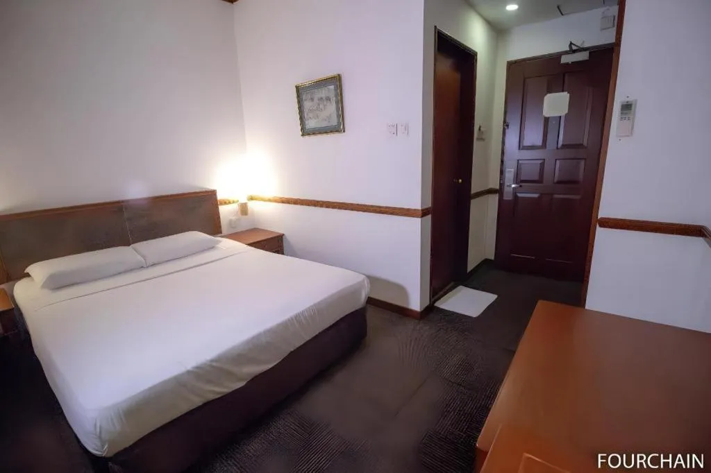 Bed in Four Chain View Hotel