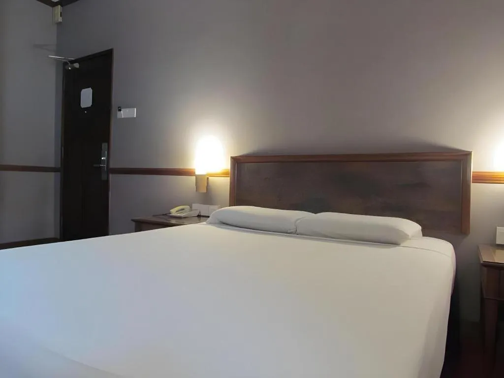 Bed in Four Chain View Hotel