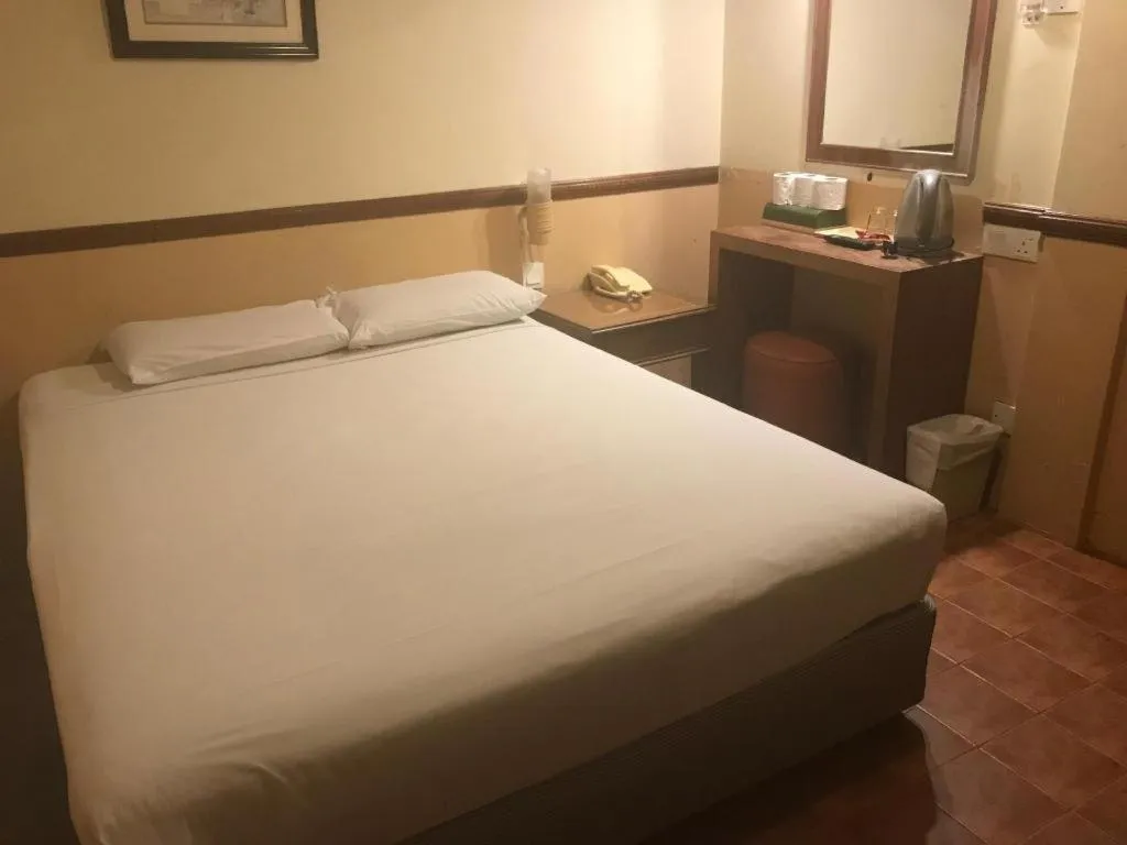 Bed in Four Chain View Hotel