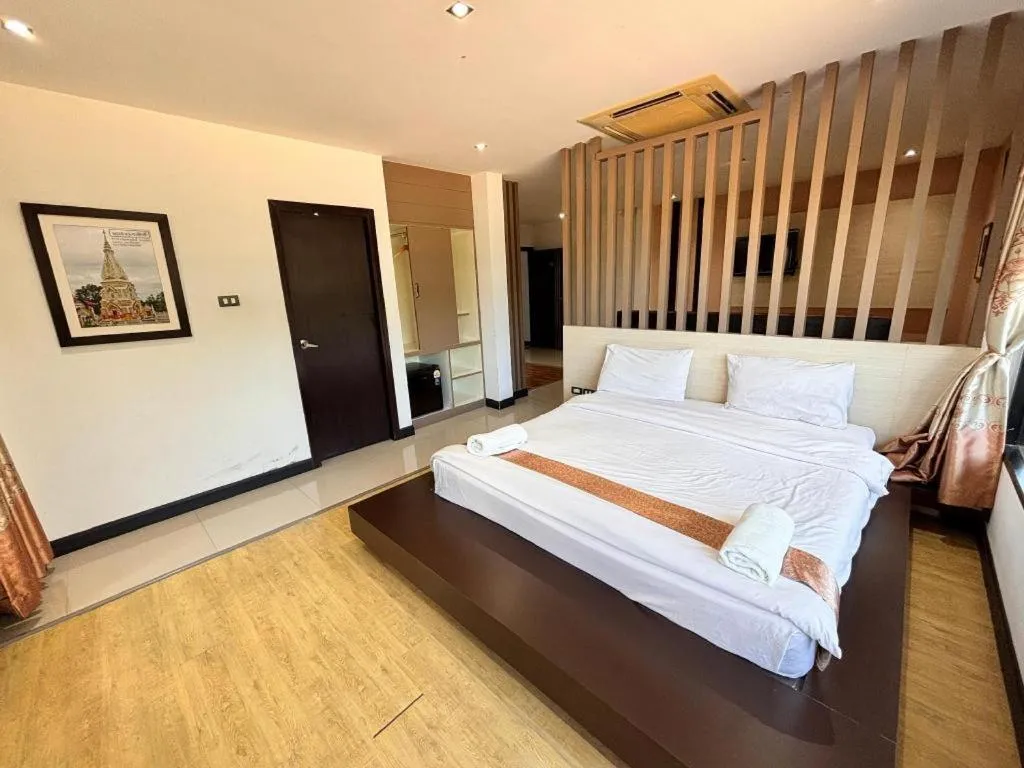 Bed in Siamgrand Hotel