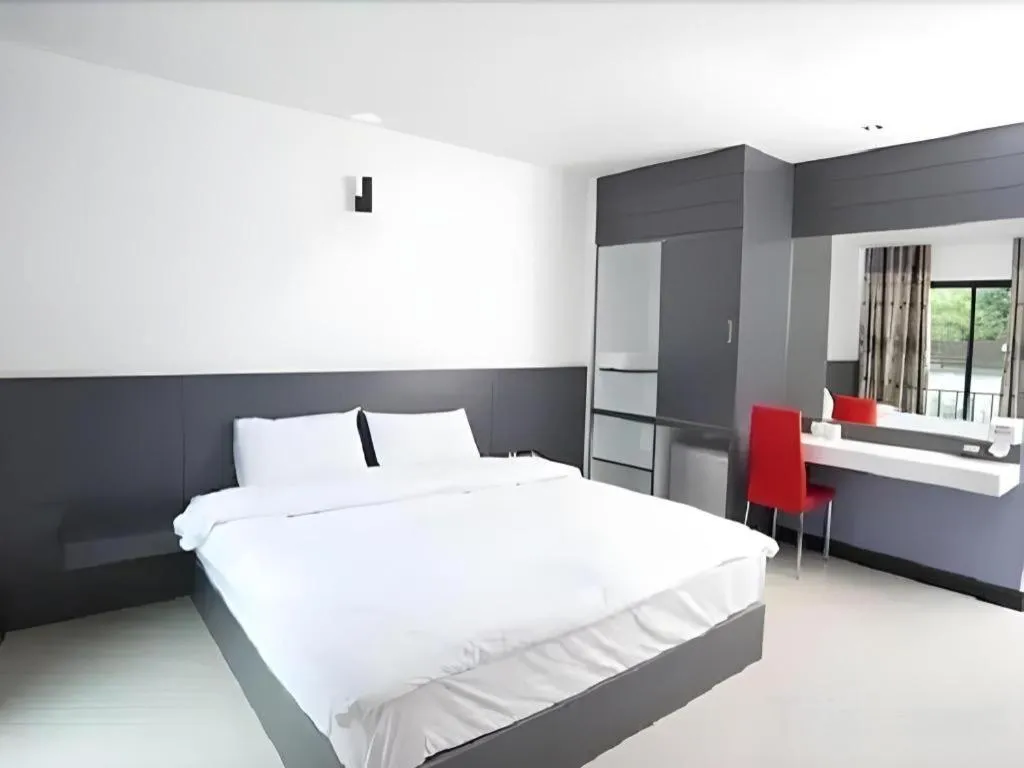 Bed in Siamgrand Hotel