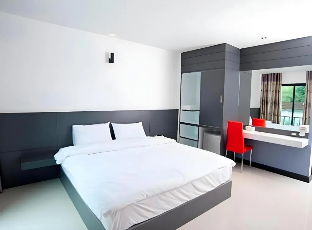 Bed in Siamgrand Hotel