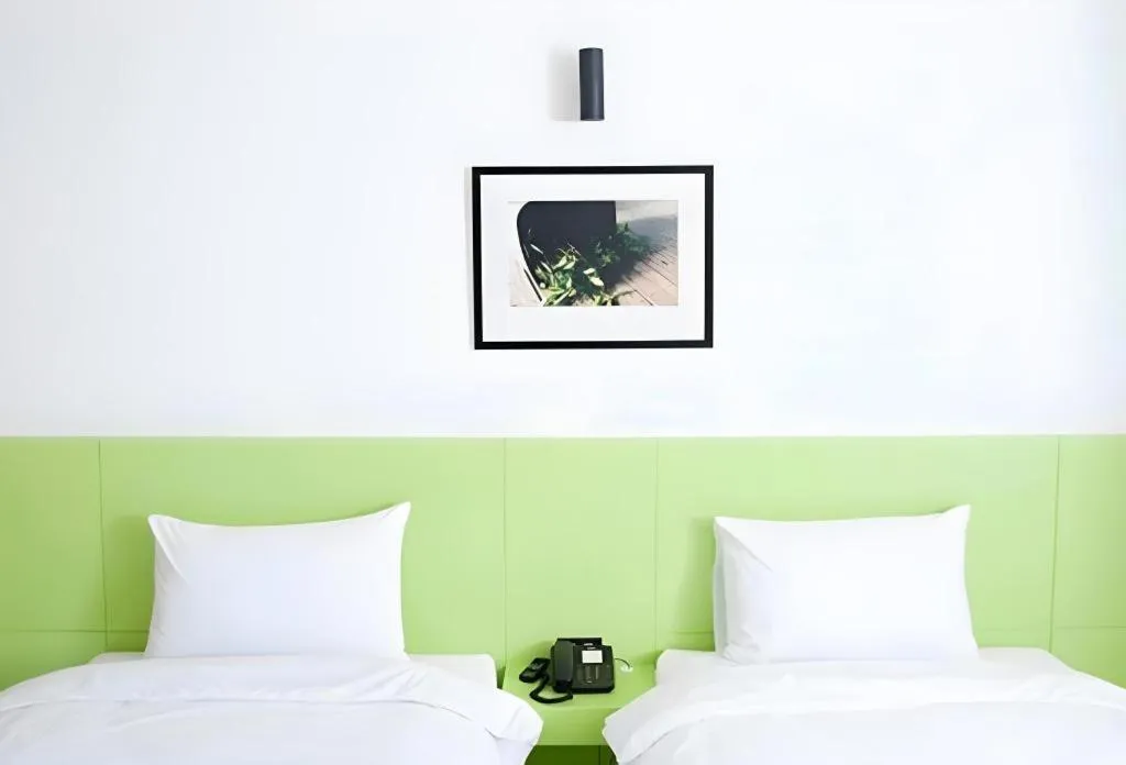 Bed in Siamgrand Hotel