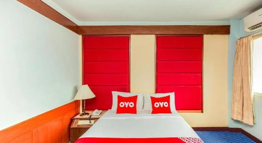 Bed in OYO 441 Grand Thara Hotel