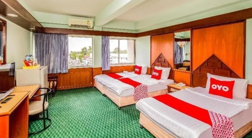 Bed in OYO 441 Grand Thara Hotel