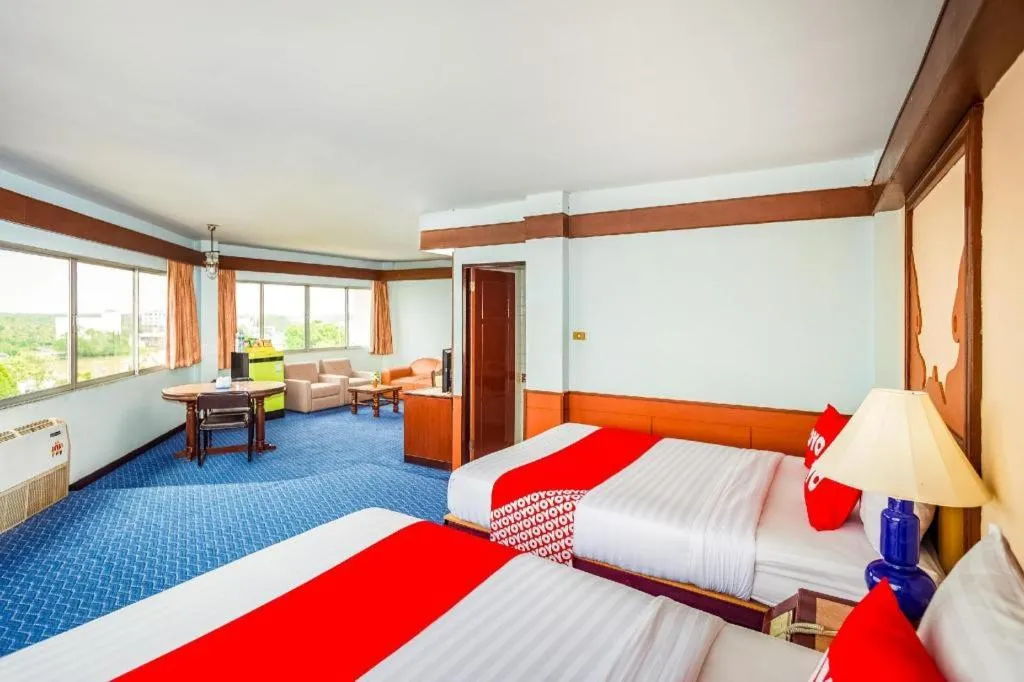 Bed in OYO 441 Grand Thara Hotel