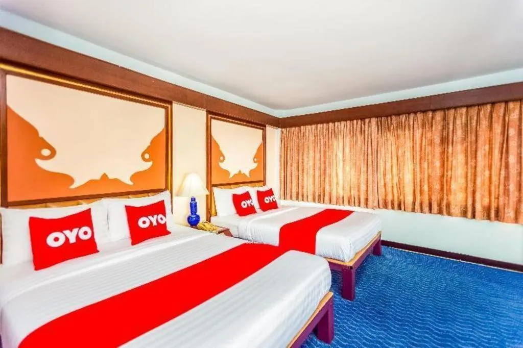 Bed in OYO 441 Grand Thara Hotel