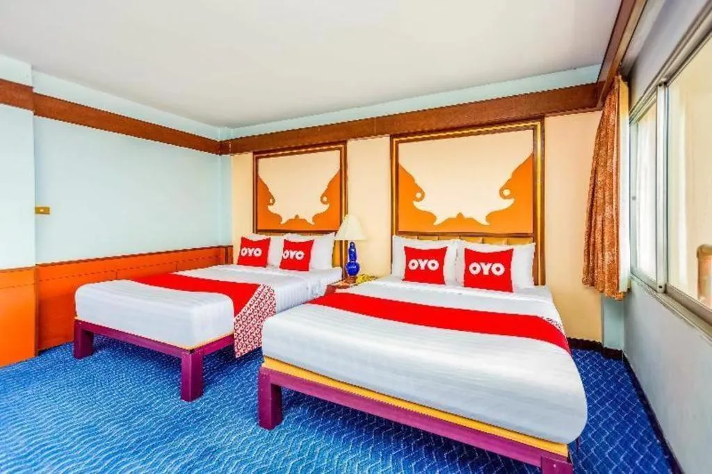 Bed in OYO 441 Grand Thara Hotel