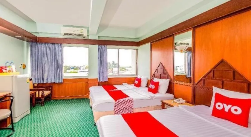 Bed in OYO 441 Grand Thara Hotel