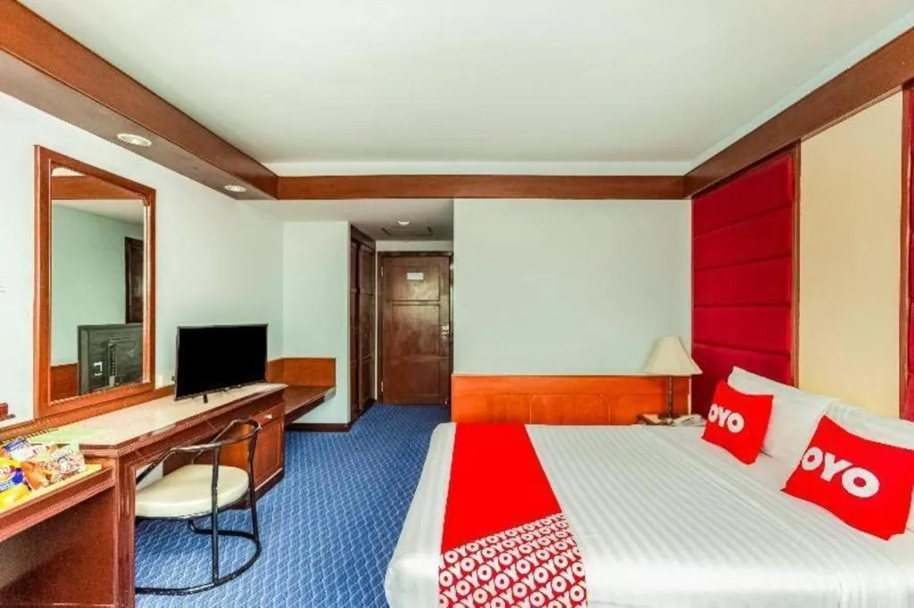 Bed in OYO 441 Grand Thara Hotel