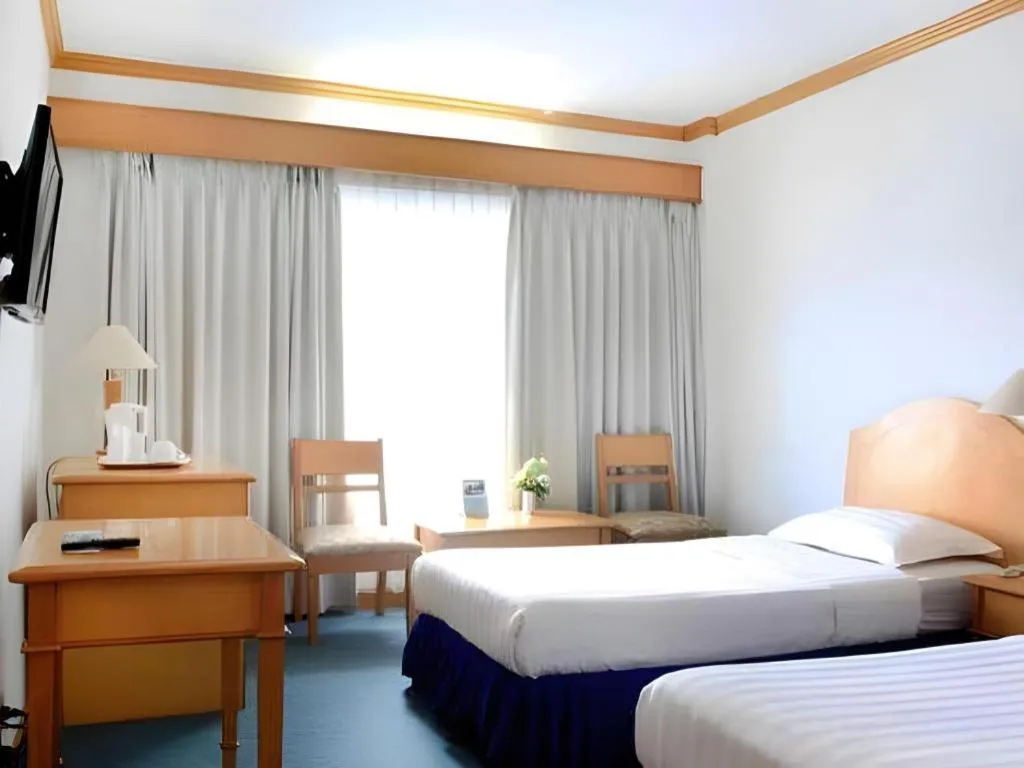 Bed in Hotel Marcopolo