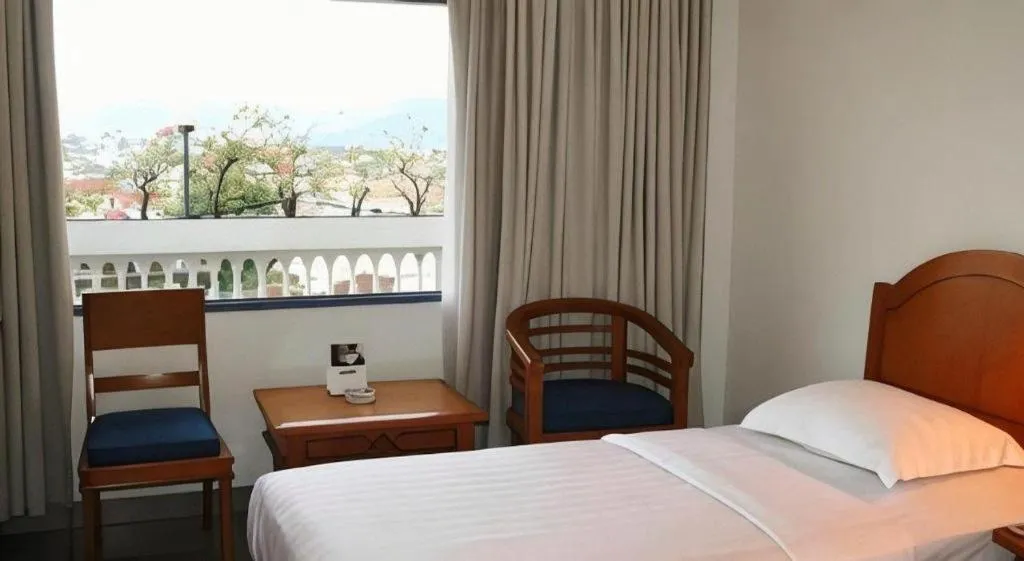 Bed in Hotel Marcopolo